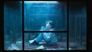 The girl was locked inside a glass dome (Image Source: Netflix)
